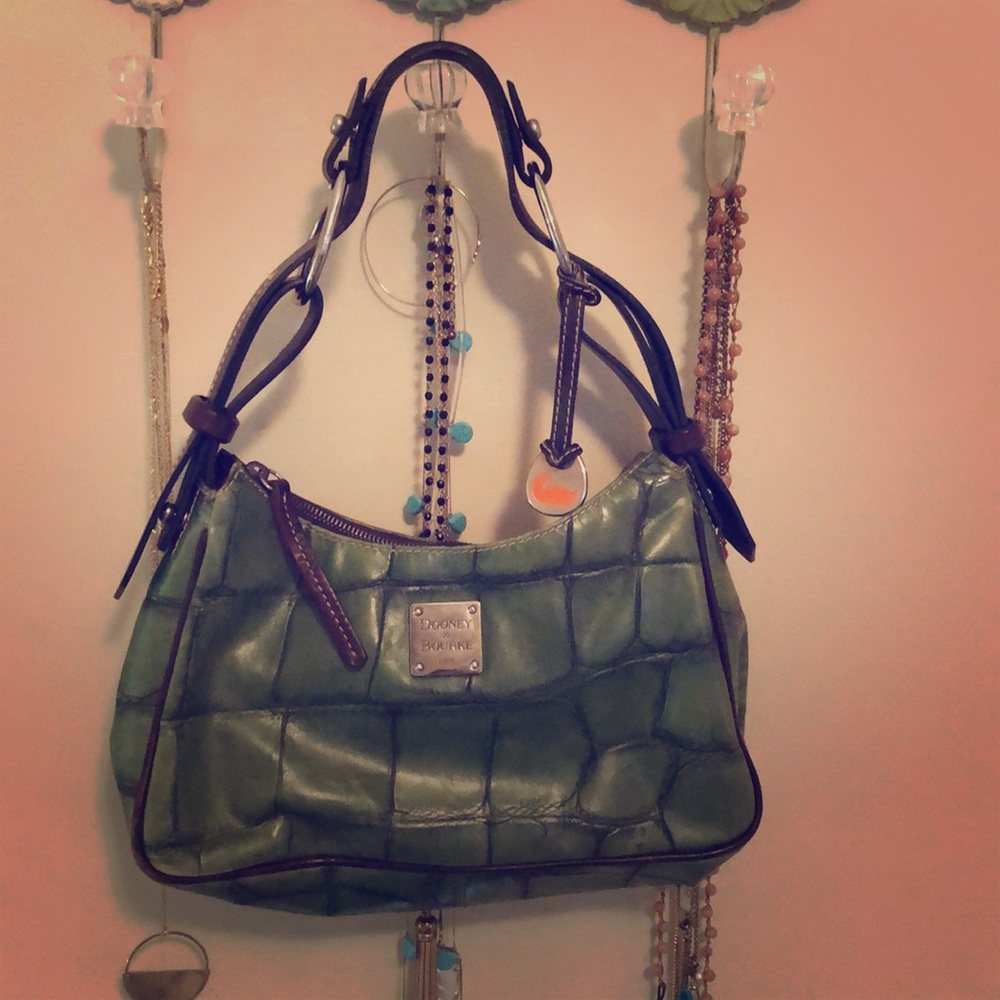 Gentley used Nile Dooney & Bourne bag